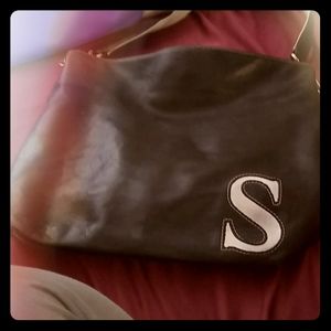 Black tote bag with the letter s